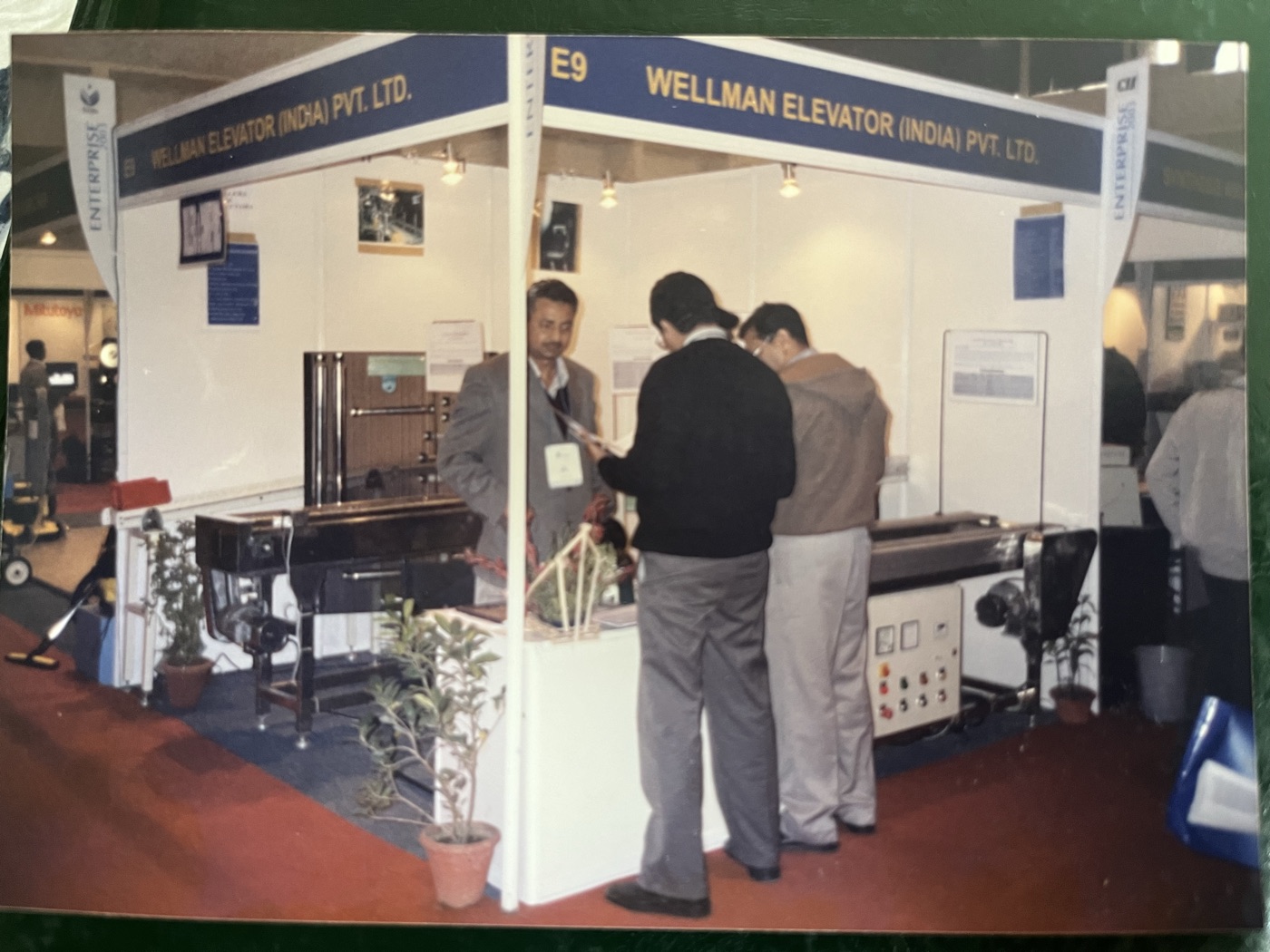 The founder of Wellman Elevator (India) Pvt. Ltd. at the company's exhibition stall (E9) at a CII enterprise expo